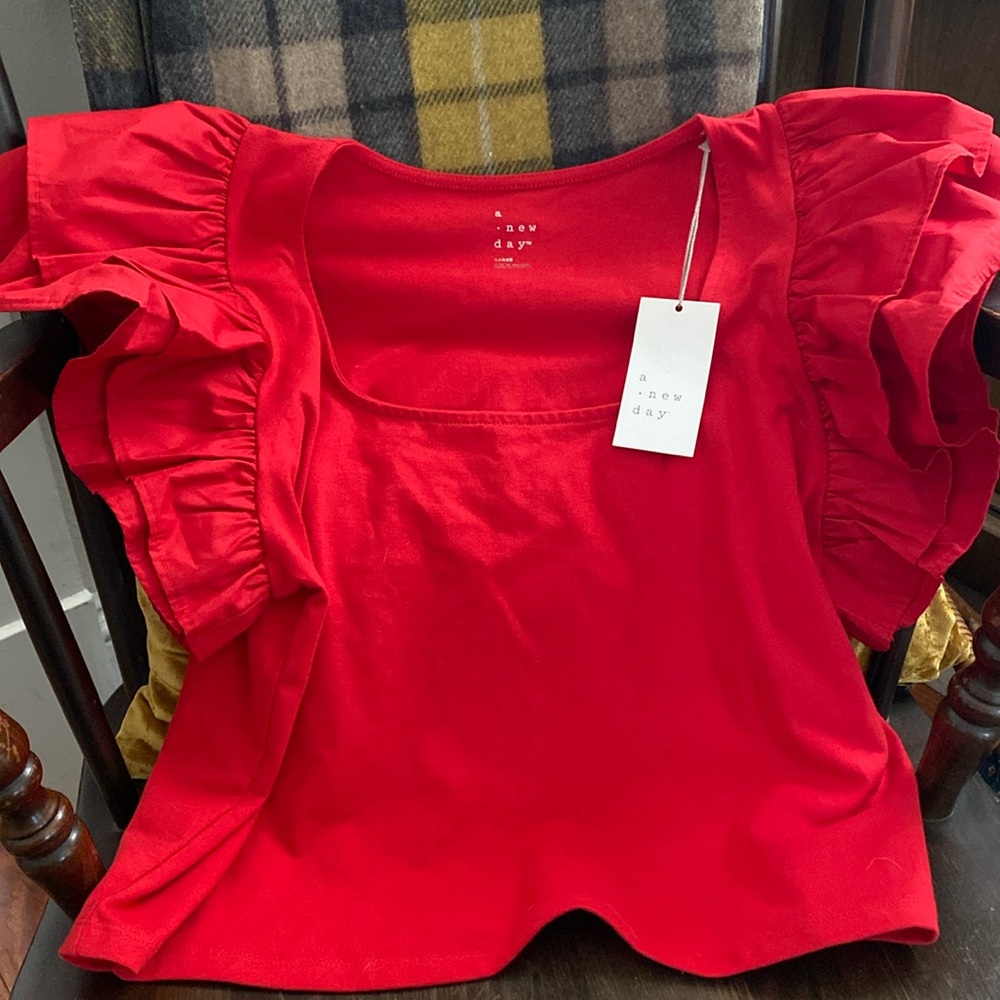 Red top with ruffle sleeves- size large